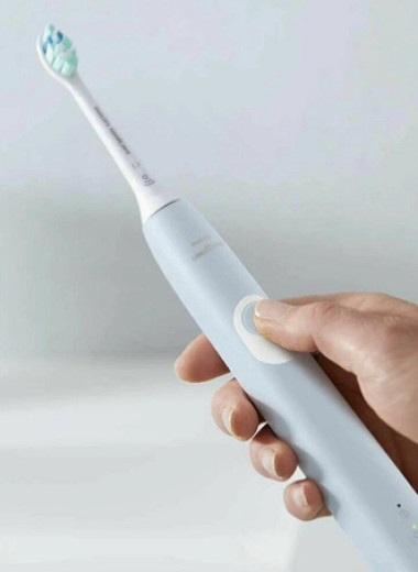 Как выбрать электрическую зубную щетку: виды, модели, особенности