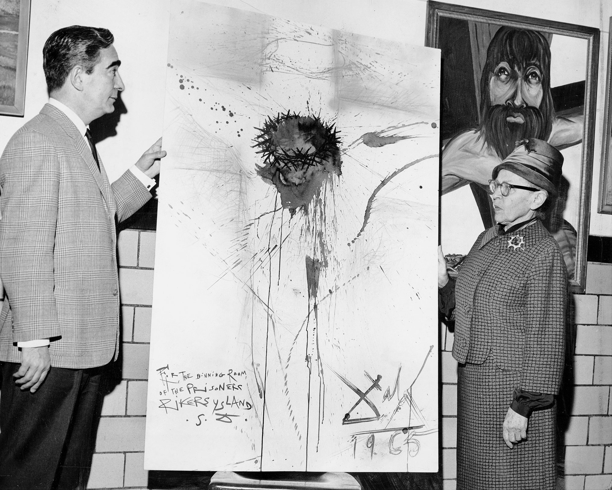 Nico Yperifanos, Salvador Dali's personal representative, presents artist's 'Christ on the Cross