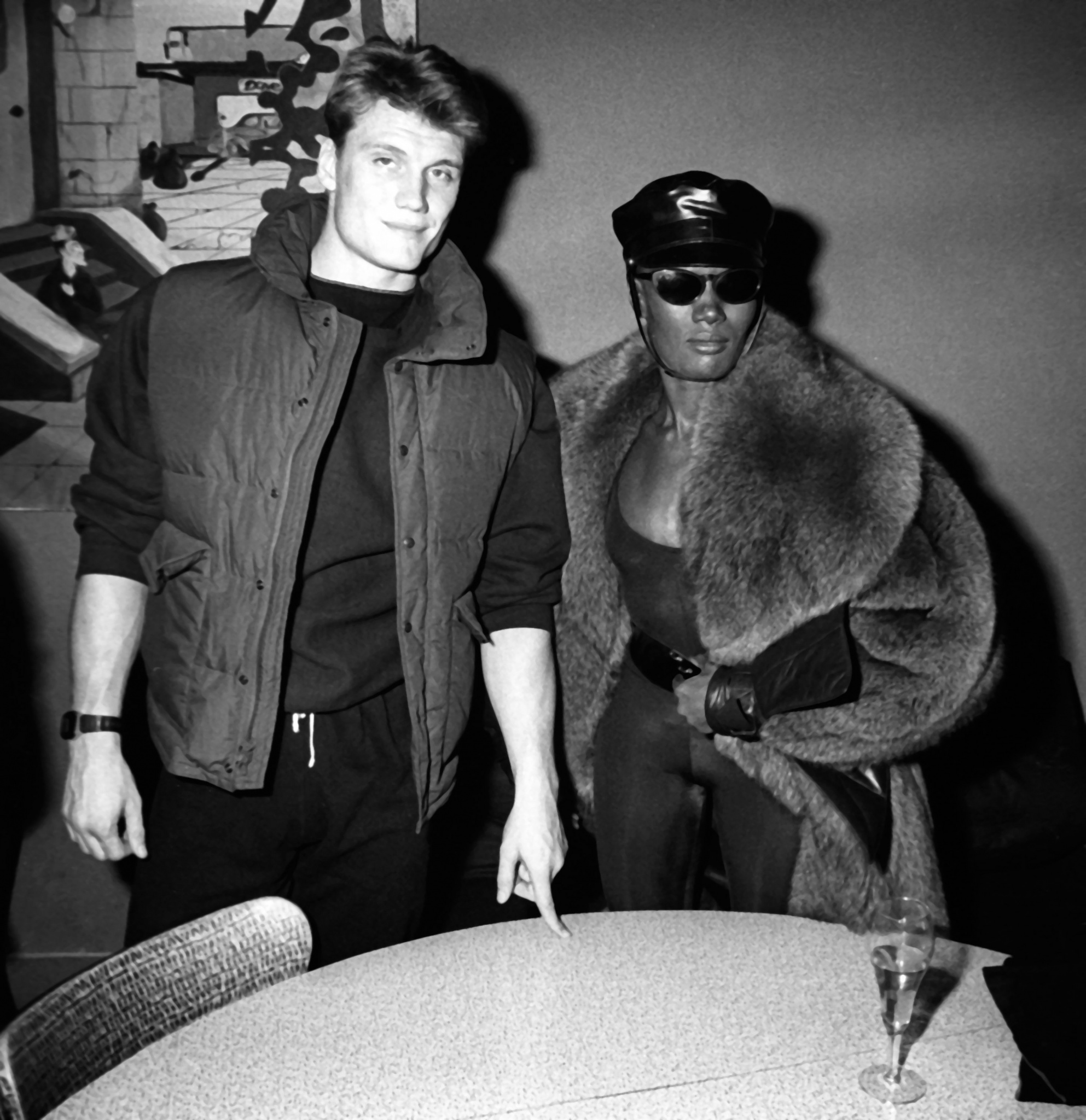 NEW YORK CITY - DECEMBER 31: Dolph Lundgren and Grace Jones attend Dolph Lundgren on December 31, 1983 at Kamikaze Club in New York City. (Photo by )