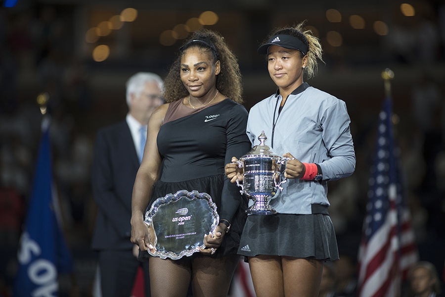 Naomi Osaka celebrates her win over Serena Williams at the 2018 U.S. Open, which jump-started her career as the most marketable female athlete on the planet ( Tim Clayton / Corbis via Getty Images )