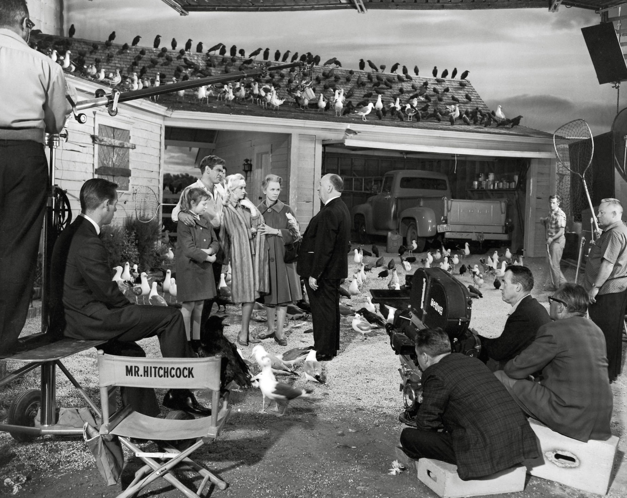 Alfred Hitchcock, Rod Taylor, Tippi Hedren, Jessica Tandy, and Veronica Cartwright during production of